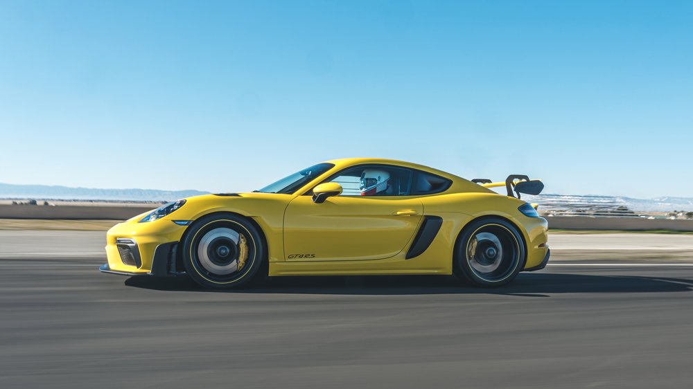 Driving the 2022 Porsche 718 Cayman GT4 RS on track.