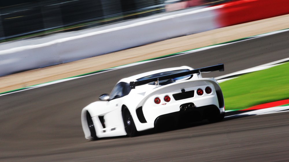 Driving the Ginetta G56 GTA on track.