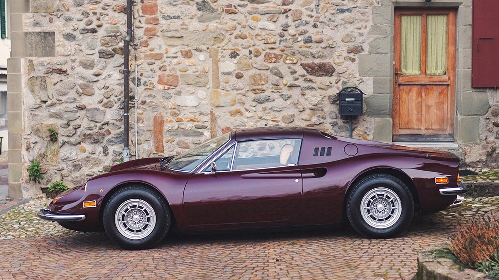 The 1973 Ferrari Dino 246 GTS “Chairs & Flares” by Scaglietti from the side