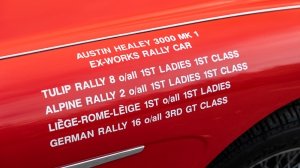 A close-up of the side of the 1960 Austin-Healey 3000 Mark I BN7 that won the 1960 Liège-Rome-Liège Rally.