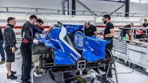 A team comprised of Delage and Idec Sport automotive specialists work on readying their race entry for the 2023 24 Hours of Le Mans.