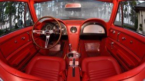 The red interior of a 1967 Corvette Sting Ray.